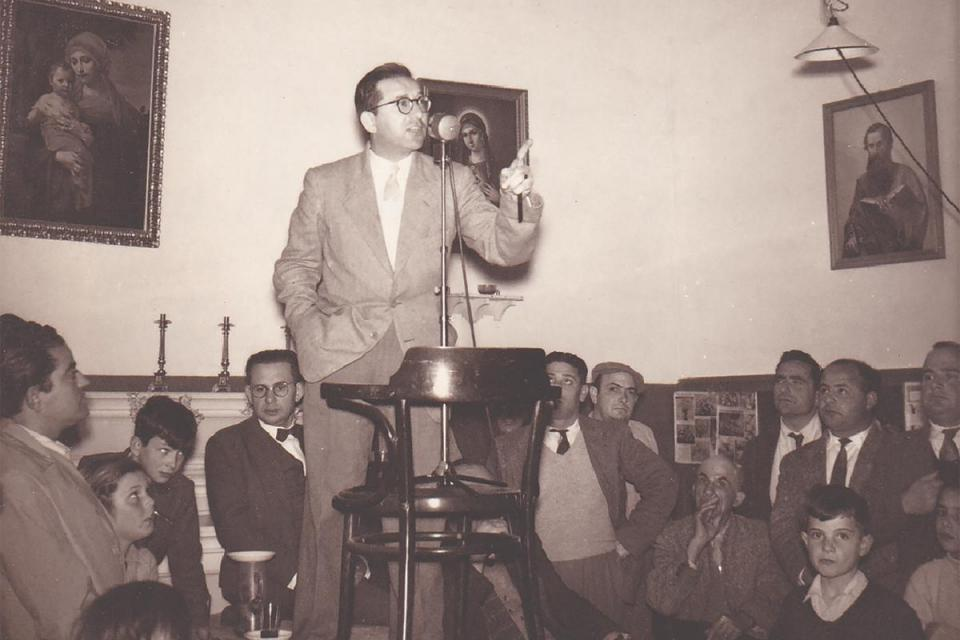 Mintoff addressing an indoor meeting in the 50s