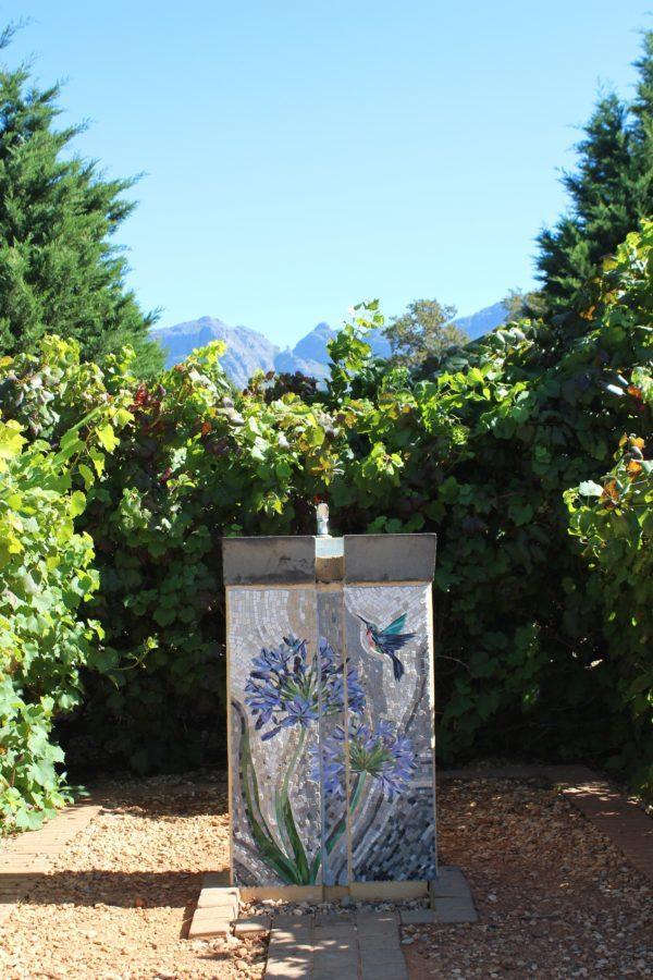 Vergelegen garden drinking fountain by mosaic artist Romé Zurnamer